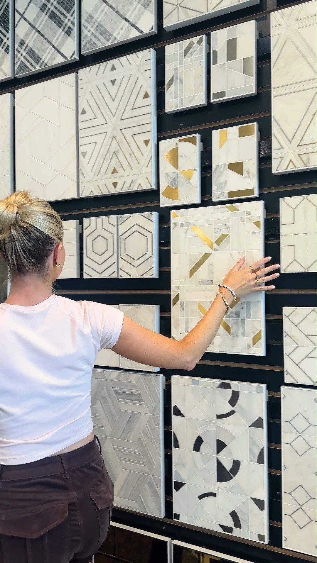 Instagram post with the caption: AKDO—Where materials meet imagination. AKDO tiles redefine s...
